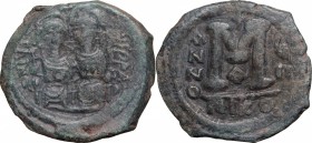 Justin II (565-578). AE Follis, Nicomedia mint, 572-573. D/ Emperor and his wife Sophia enthroned facing. R/ Large M (mark of value). MIB 46b. Sear 36...