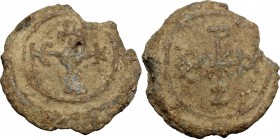 PB Seal, 6th-8th century AD. D/ Cruciform invocative monogram. R/ Cruciform invocative monogram. PB. g. 18.85 mm. 28.00 VF.