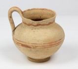 Daunian Pottery olpe.
 Bulbous body, strap handle, flared rim and painted reddish-brown bands.
 3rd century BC.
 H. 12 cm (with handle).