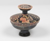 Apulian red-figure lekanis with female heads (Ladies of Fashion).
 4th century BC.
 9.5 cm diameter; 10.5 cm height.