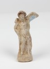 Terracotta tanagra statuette of Eros.
 Traces of original colors.
 Greek, 3rd century BC.
 H 10.5 cm
 Right wing missing.