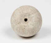 Terracotta Pomegranate.
 Spherical body, hollow, with four lines on the top. Traces of withe paint.
 Greek, 3rd century BC.
 H 4.5 cm, Ø 5.5 cm.