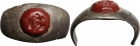 Silve ring with red jasper stone engraved with picture of Amor.
 Roman period, 2nd-4th century.
 Size 20 mm.