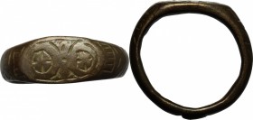 Bronze ring, the bezel decorated with two crosses.
 Middle ages.
 Size 15.5 mm.