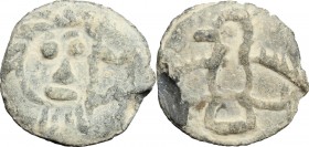 Italy. Southern Italy. The Normans (?). PB Tessera, 11th (?) century AD. D/ Stylized head facing. R/ Stylized bird flying. PB. g. 2.46 mm. 14.00 VF.