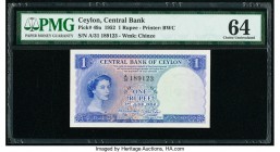 Ceylon Central Bank of Ceylon 1 Rupee 3.6.1952 Pick 49a PMG Choice Uncirculated 64. 

HID09801242017