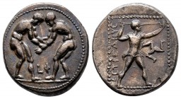Pamphylia, Aspendos AR Stater.Pamphylia, Aspendos AR Stater. Circa 380-325 BC. Two wrestlers grappling; MA between / Slinger standing right; triskeles...
