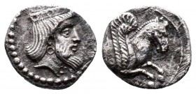Cilicia, Uncertain AR Obol. 4th century BC. Crowned and bearded head of Persian King right / Forepart of Pegasos right. Göktürk –; Troxell & Kagan
Con...