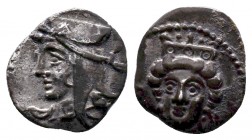 Cilicia, uncertain mint AR Obol. 4th century BC. Head of female facing slightly left, wearing crown and earrings; rose to left / Head of Satrap left. ...