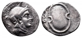 Ancient Greek coins Cilicia, Tarus, obol. 333-323 BC, Balakros. Av: Athena head with Attic helmet to the right. Rev: oval shield, left the letter "B" ...