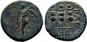 MACEDONIA.Philippi Pseudo-autonomous issue. Bronze circa 41-68 Time Claudius or Nero.AE Bronze. VIC AVG Victory standing l. on base, holding wreath an...