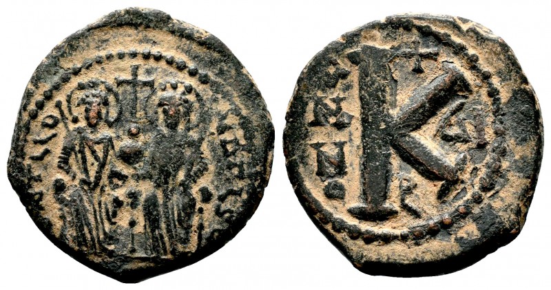 Justin II , with Sophia (565-578 AD). AE Half Follis

Condition: Very Fine

Weig...