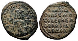 Basil I the Macedonian, with Constantine and Leo VI. 867-886. Æ Follis. Constantinople mint. Struck 870-879. Crowned half-length figures of Basil, wea...