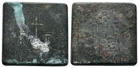Byzantine Weights, Circa 5th-7th centuries. Weight of 1 Ounkia a uniface square commercial weight with triple-grooved edges. Γᴑ Γ with cross between; ...
