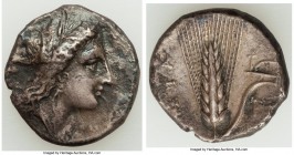 LUCANIA. Metapontum. Ca. 330-280 BC. AR stater (20mm, 7.47 gm, 9h). VF. Head of Demeter right, crowned with grain; ΔAI (off flan) before / META, grain...