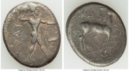 BRUTTIUM. Caulonia. Ca. 475-410 BC. AR stater (19mm, 7.77 gm, 2h). Choice Fine. KAVA (retrograde), nude Apollo striding right, laurel branch in uprais...