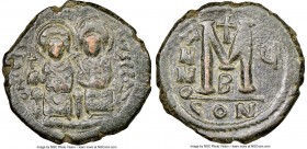 Justin II (AD 565-578), with Sophia. AE follis (29mm, 14.13 gm, 7h). NGC Choice VF 4/5 - 4/5. Constantinople, 2nd officina, Regnal Year 6 (AD 570/1). ...