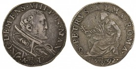 stati pontifici 
Clemente VIII (1592-1605) - Testone 1592 Anno I - Zecca: Roma - Diritto: effigie del Papa a destra - Rovescio: San Pietro seduto a s...