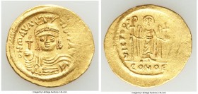 Maurice Tiberius (AD 582-602). AV solidus (22mm, 4.51 gm, 7h). Choice VF, graffiti, scratches. Constantinople, uncertain officina. o N mAVRC-TIb PP AV...