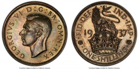 George VI Proof Shilling 1937 PR65 PCGS, KM853, S-4082. Muted by olive gray toning sheathed in pastel colors that interplay beautifully off the brilli...