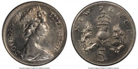 Elizabeth II Mint Error - Struck on 4.32gm copper-nickel Planchet 5 New Pence 1977 AU58 PCGS, KM911. 

HID09801242017