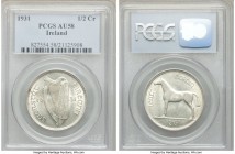 Free State 1/2 Crown 1931 AU58 PCGS, KM8. This coin has the slightest bit of wear while retaining full mint luster.

HID09801242017