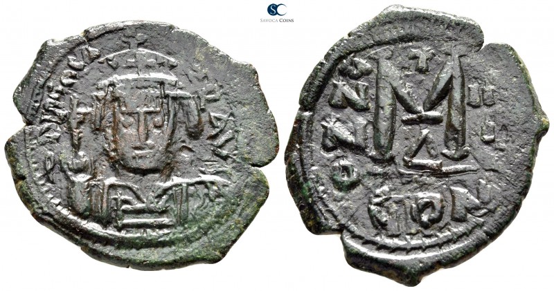 Maurice Tiberius AD 582-602. Overstruck on a Follis of Phocas. Constantinople
F...
