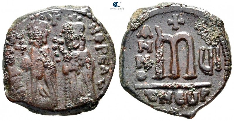 Phocas, with Leontia AD 602-610. Theoupolis (Antioch)
Follis Æ

28 mm., 10,06...