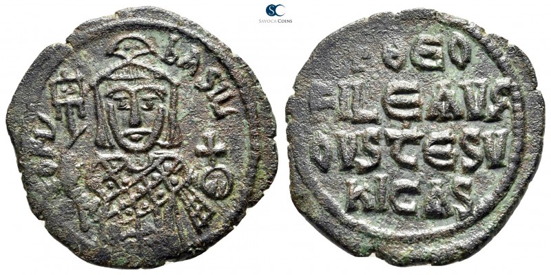 Theophilus AD 829-842. Constantinople
Follis Æ

25 mm., 4,44 g.



very f...