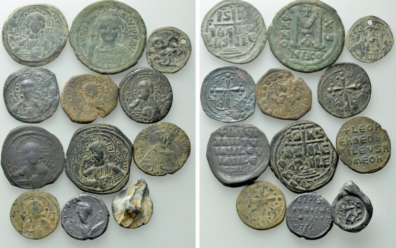 12 Byzantine Coins and Seals. 

Obv: .
Rev: .

. 

Condition: See picture...