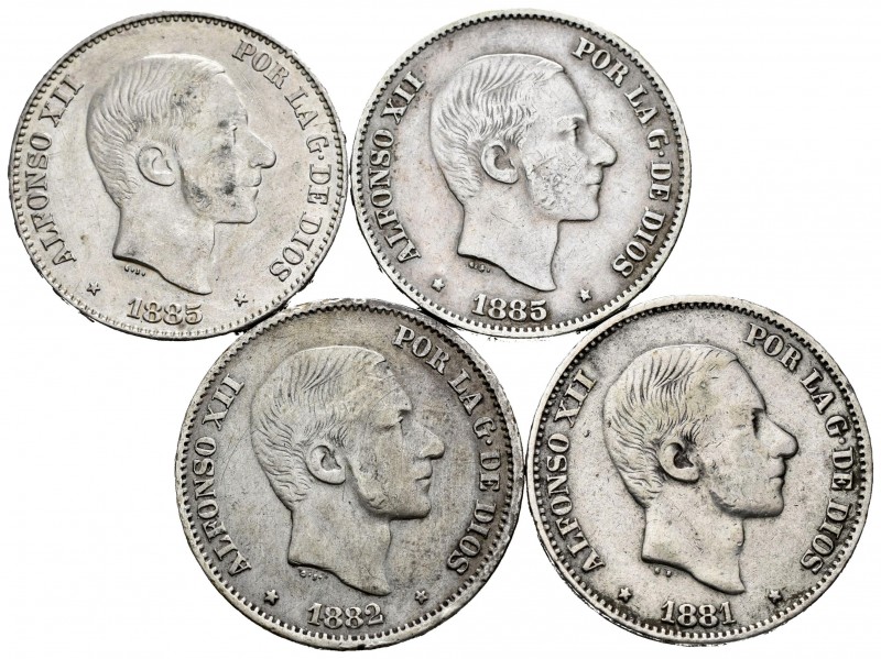 Alfonso XII (1874-1885). Lote de 4 piezas de 50 centavos de Manila, 1881, 1882, ...