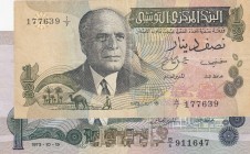 Tunisia, 1/2 Dinar and 1 Dinar, 1973, VF/ XF, p69, p70, (Total 2 banknotes)
Estimate: 15-30 USD