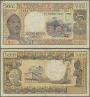 Cameroon: 5000 Francs ND(1974) P. 17b, used with several folds and light stain in paper, no holes, still nice color, condition: F.
 [zzgl. 19 % MwSt....