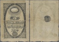 Turkey: Ottoman Empire 10 Kurus ND(1853-54) with seal of Ahmed Muhtar on back, P.23, still intact with small border tears and toned paper, Condition: ...