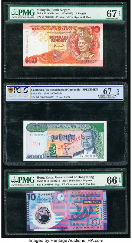 World (Cambodia, Hong Kong, Malaysia) Group Lot of Three Graded Notes. Cambodia ...