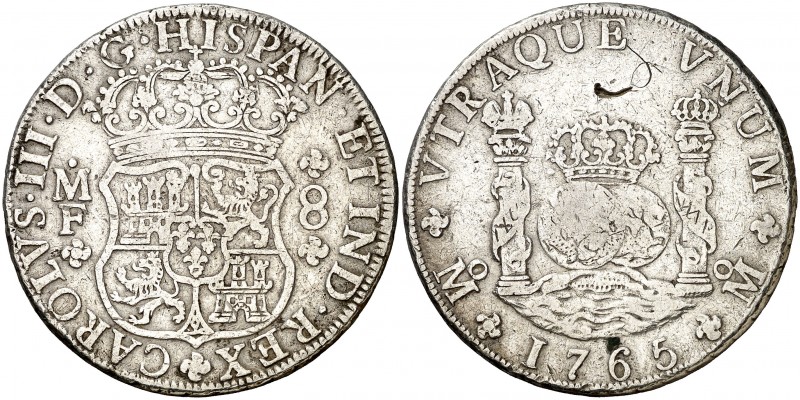 1765. Carlos III. México. MF. 8 reales. (Cal. 901). 26,61 g. Columnario. Pequeña...