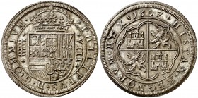 * 1597. Felipe II. Segovia. 8 reales. (Cal. 231). 26,57 g. Tipo "OMNIVM". Golpecito en canto. Pequeño exceso de plata en reverso. Bella. Moneda exenta...