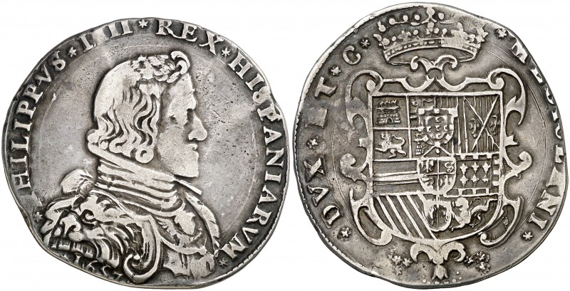 1657. Felipe IV. Milán. 1 felipe. (Vti. 15) (MIR 364/1)1. 26,57 g. Con ángel en ...