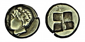 Lonia. Phokaia. electrum, (477 - 388) BC.
Vs: Head of juvenile Dionysus with ivy wreath connections, including seal after connections. Rs: Four-part s...