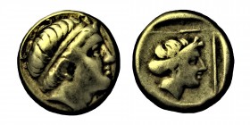 LESBOS, Mytilene. EL Hekte. Circa (377-326) BC. 
(Electrum,Young male head to right, wearing taenia with frontal horn. Rev. Female head to right, her ...