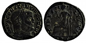 CONSTANTIUS I (305-306). Follis. Ticinum. 
Obv: IMP C CONSTANTIVS P F AVG. Laureate head right. Rev: FIDES MILITVM / ST. Fides seated left on throne, ...