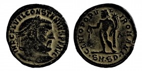 Follis Coined CONSTANTINO I. (307 A.D.) 
Rev. GENIO POPVLI ROMANI. SMSD. Genie standing on the left with patera and cornucopia. AE. black patina C-219...