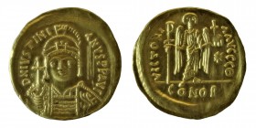 Justinian I, (527-565) AD.
Gold Solidus of Constantinople. Crowned bust facing / Angel standing. S.140. Mint. 
4,48 gr. 20,5 mm.