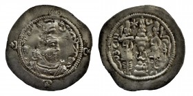 Sasanian Kings, Khusro I (531-579)
Drachm, AR Decorated facing bust r., wearing earrings and mural crown surmounted by globe or korymbos and crescent,...