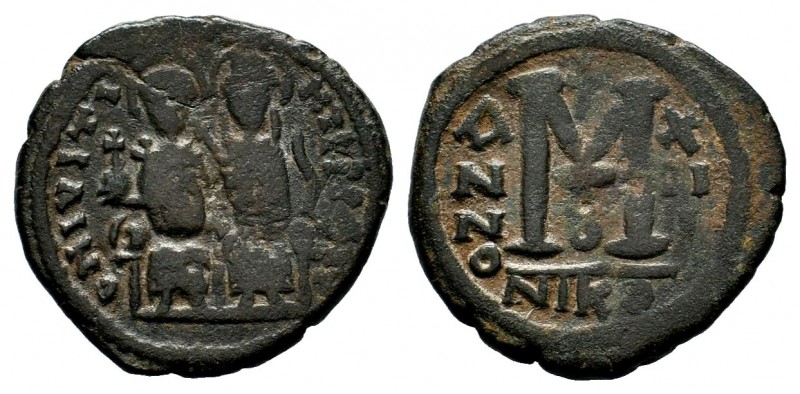 Justin II, with Sophia. 565-578. Æ Follis
Condition: Very Fine

Weight: 12,09 gr...