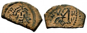 ARAB-BYZANTINE. Early Caliphate (636-660). Ae Fals. 
Condition: Very Fine

Weight: 5,79 gr
Diameter: 16,10 mm