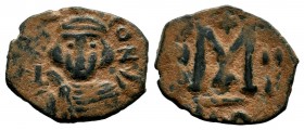 ARAB-BYZANTINE. Early Caliphate (636-660). Ae Fals. 
Condition: Very Fine

Weight: 3,04 gr
Diameter: 18,00 mm