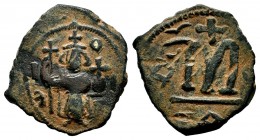 ARAB-BYZANTINE. Early Caliphate (636-660). Ae Fals. 
Condition: Very Fine

Weight: 5,71 gr
Diameter: 24,00 mm