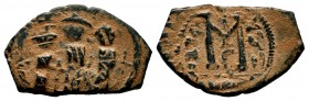 ARAB-BYZANTINE. Early Caliphate (636-660). Ae Fals. 
Condition: Very Fine

Weight: 5,00 gr
Diameter: 17,20 mm