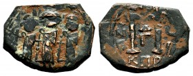 ARAB-BYZANTINE. Early Caliphate (636-660). Ae Fals. 
Condition: Very Fine

Weight: 4,96 gr
Diameter: 18,60 mm